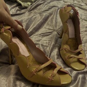 Adorable tan patent leather with pink piping Manolo's size 38